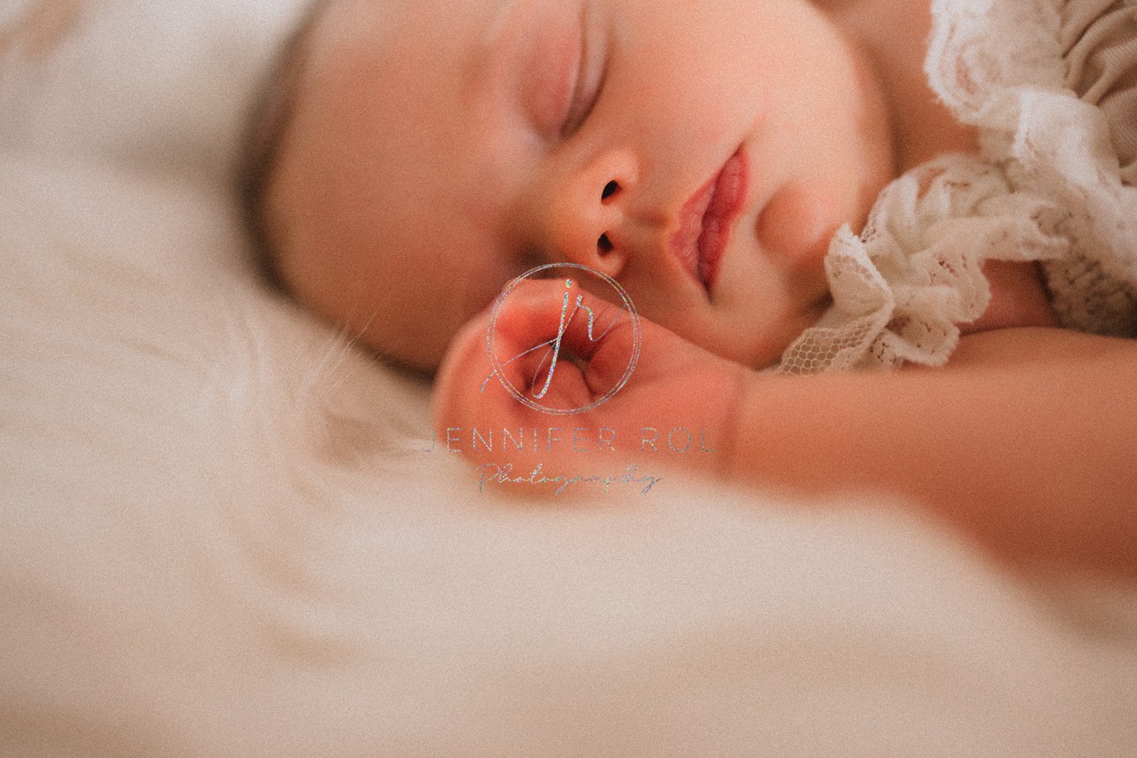 Details of a sleeping newborn baby's face