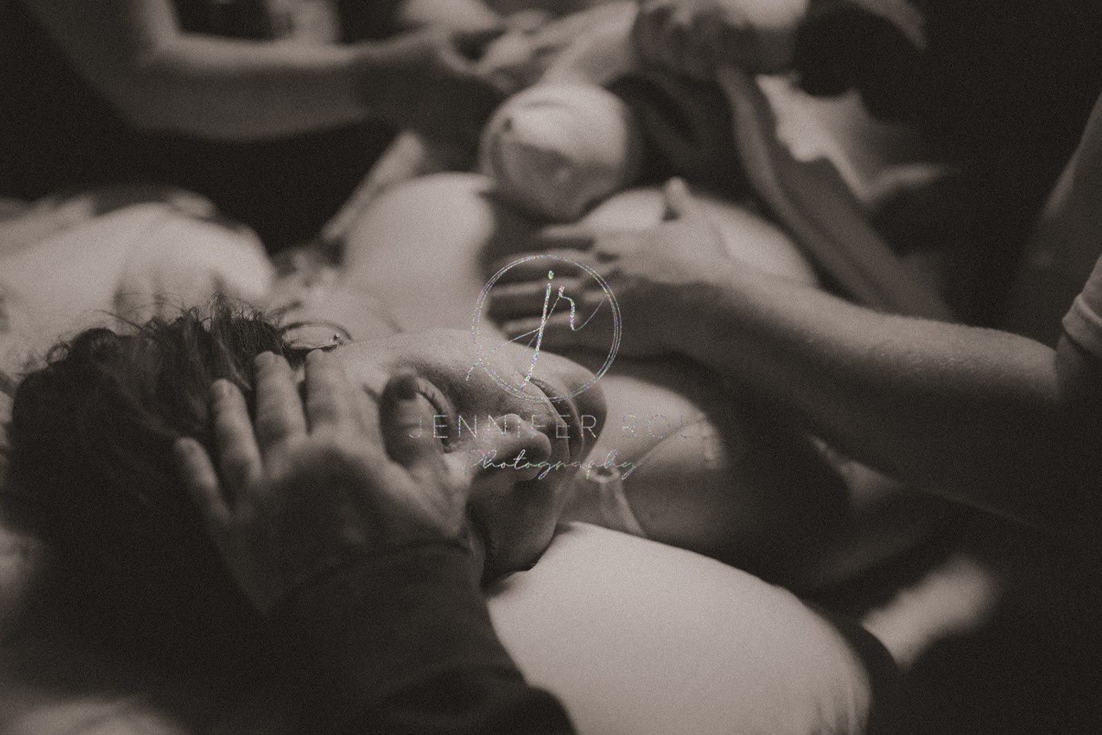 A new mom rests directly after delivery with her newborn on her chest before looking for pelvic floor therapy in Missoula