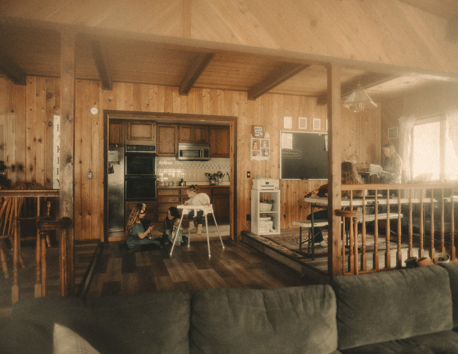 A look into the lives of 5 siblings from teen to infant playing in their home with dolls, books and a violin before visiting Garden City Ballet